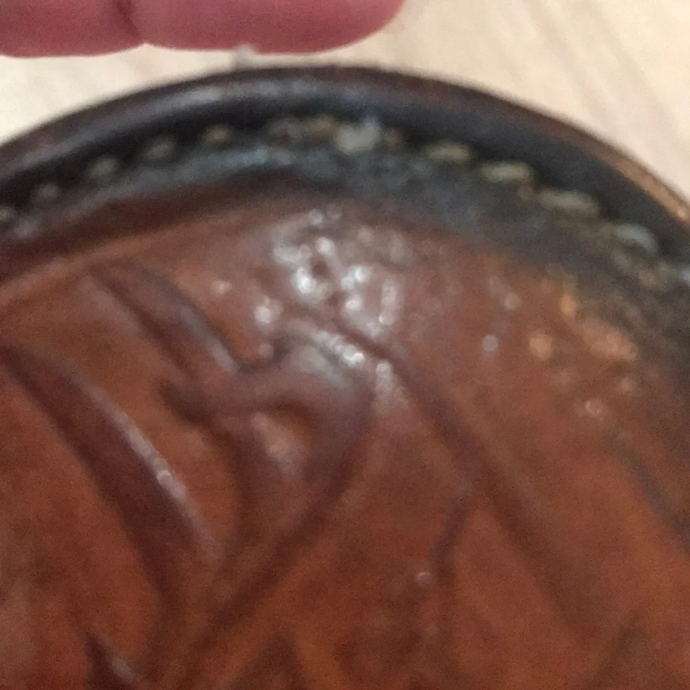 - Handcrafted leather seat belt buckle in brown